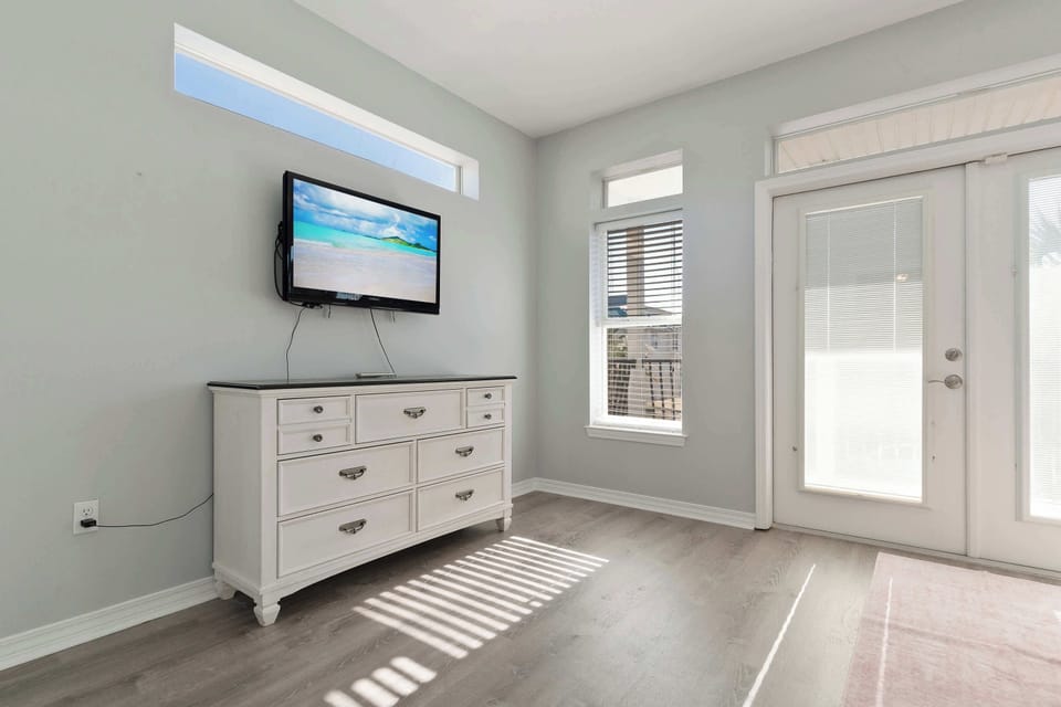 Plenty of storage for clothes, a large Smart TV, and a private balcony!