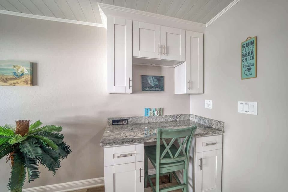 Work from Paradise. Indulge in Beachfront Luxury with The Perfect Blend between Comfort and Functionality. All the Comforts of Home in Our Coastal Home Away from Home