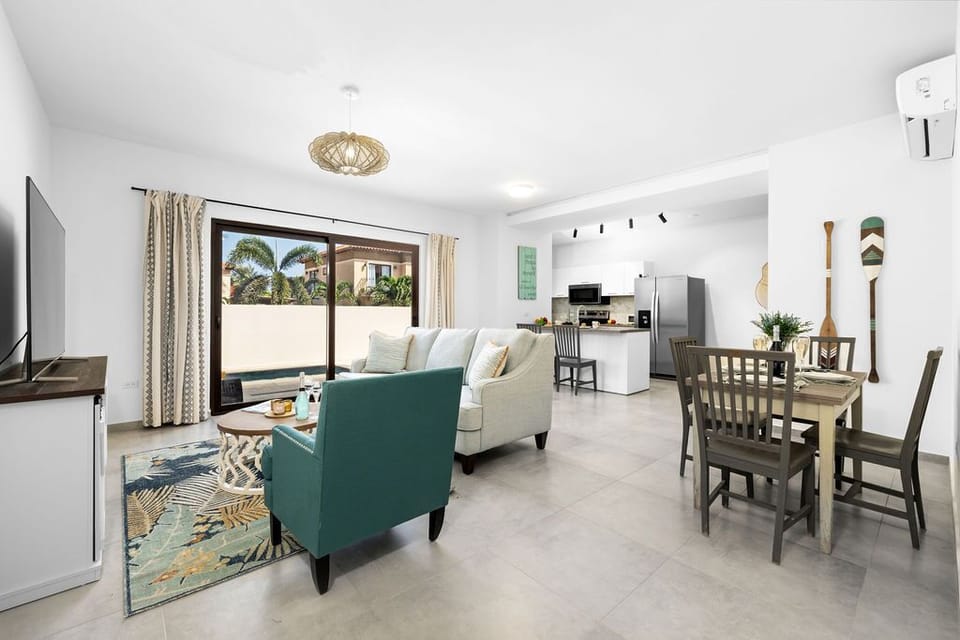The living room features a vibrant interior that radiates a positive atmosphere.