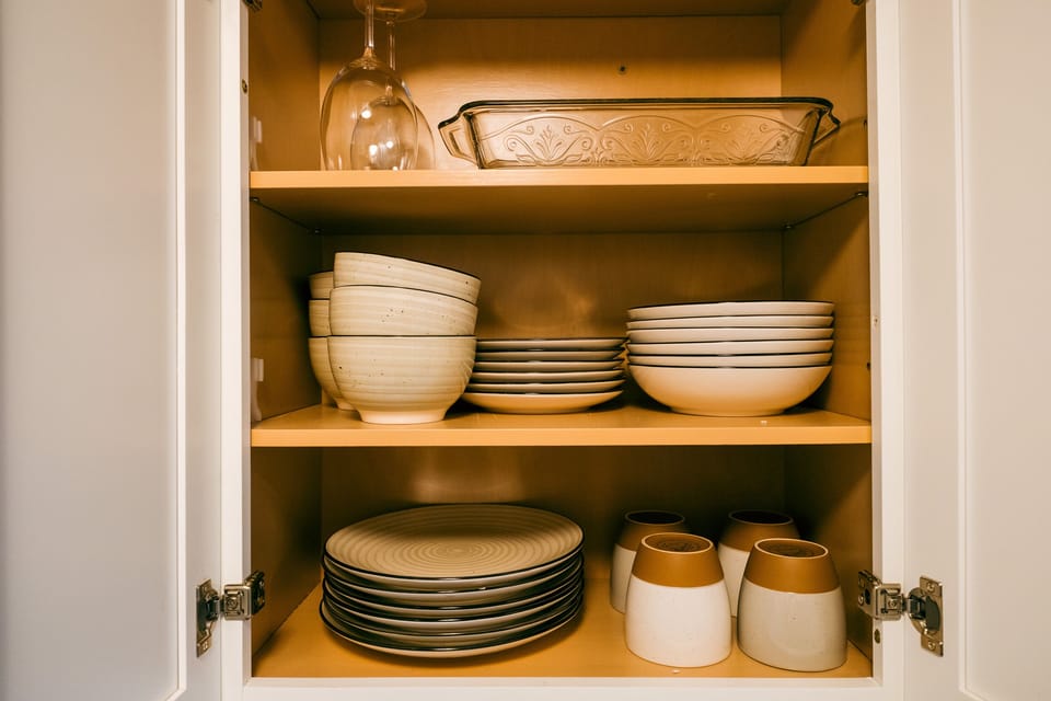 dishes, plates and cups, wine opener.