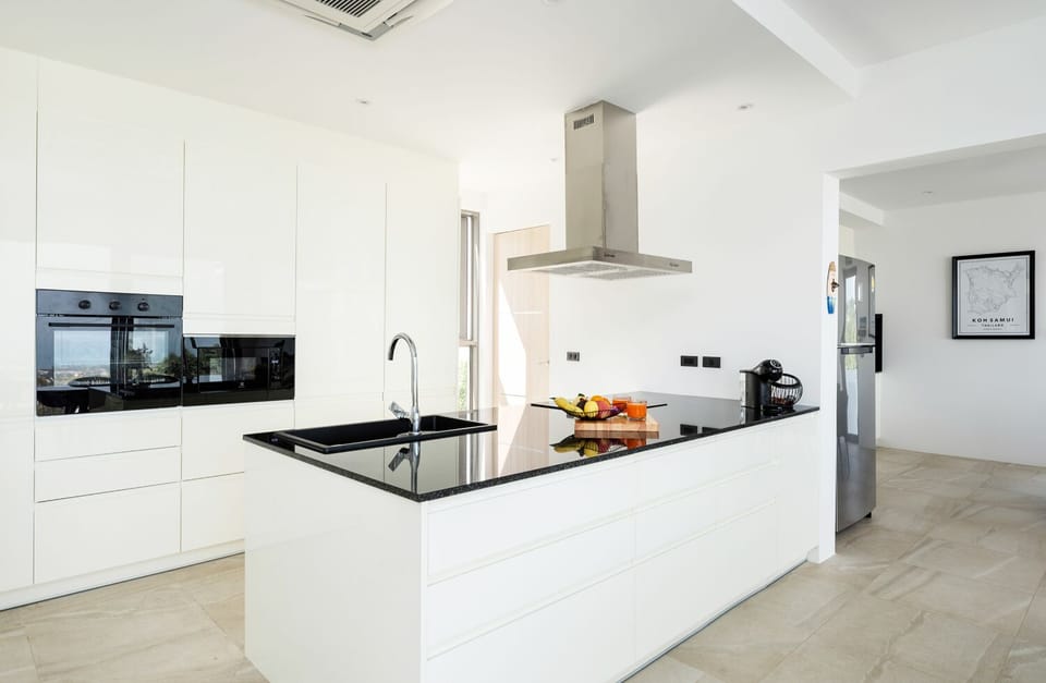 Exclusive Villa | Private kitchen | Full-size fridge, microwave, oven, stovetop