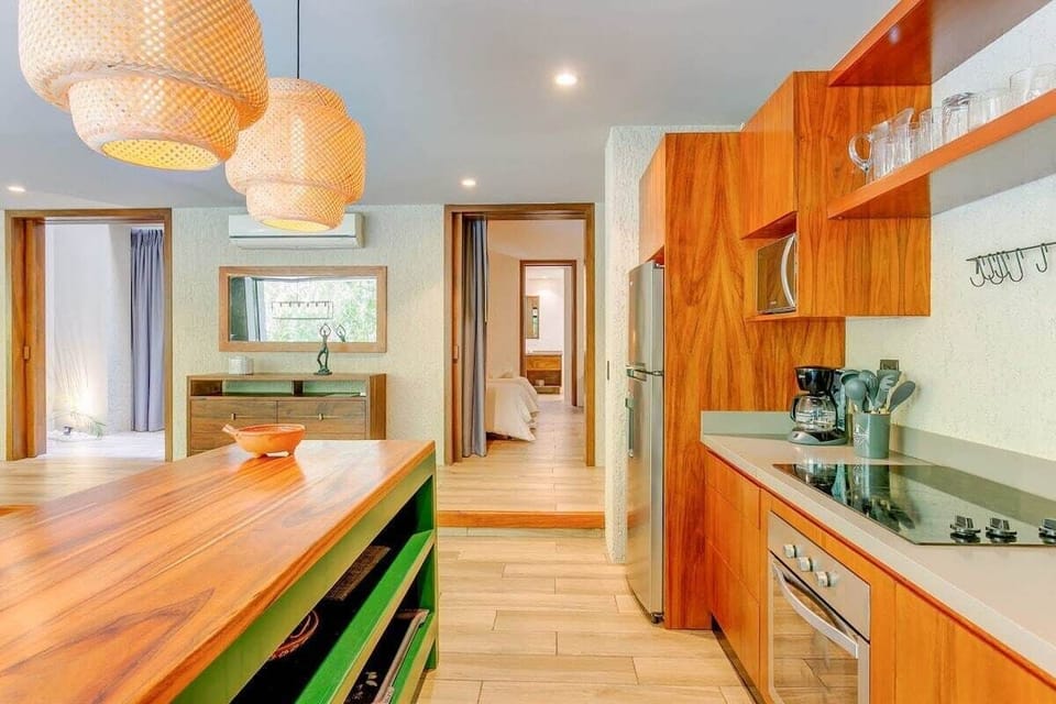 Create culinary magic in this stunning, wood-accented kitchen.