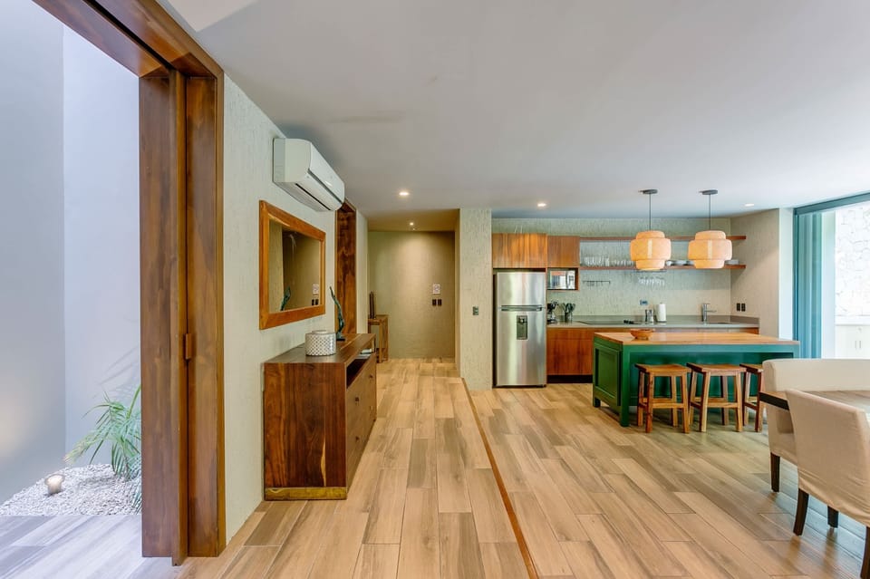 Effortless flow from cooking to lounging in this grand space.