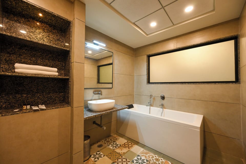 Premium Studio | Bathroom | Free toiletries, slippers, towels, soap