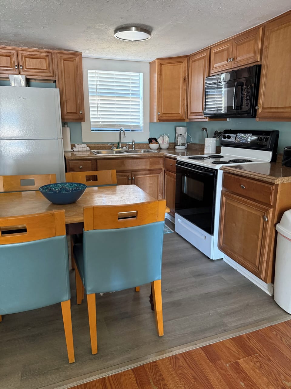 Barefoot Cottages | Private kitchen | Fridge, microwave, oven, stovetop