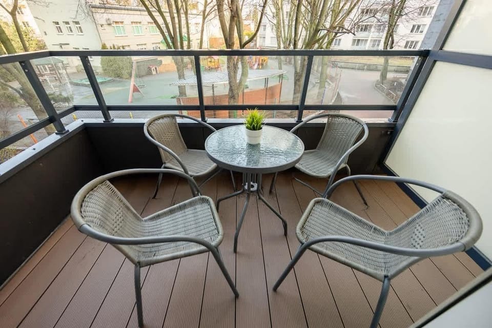 Private balcony with garden furniture.