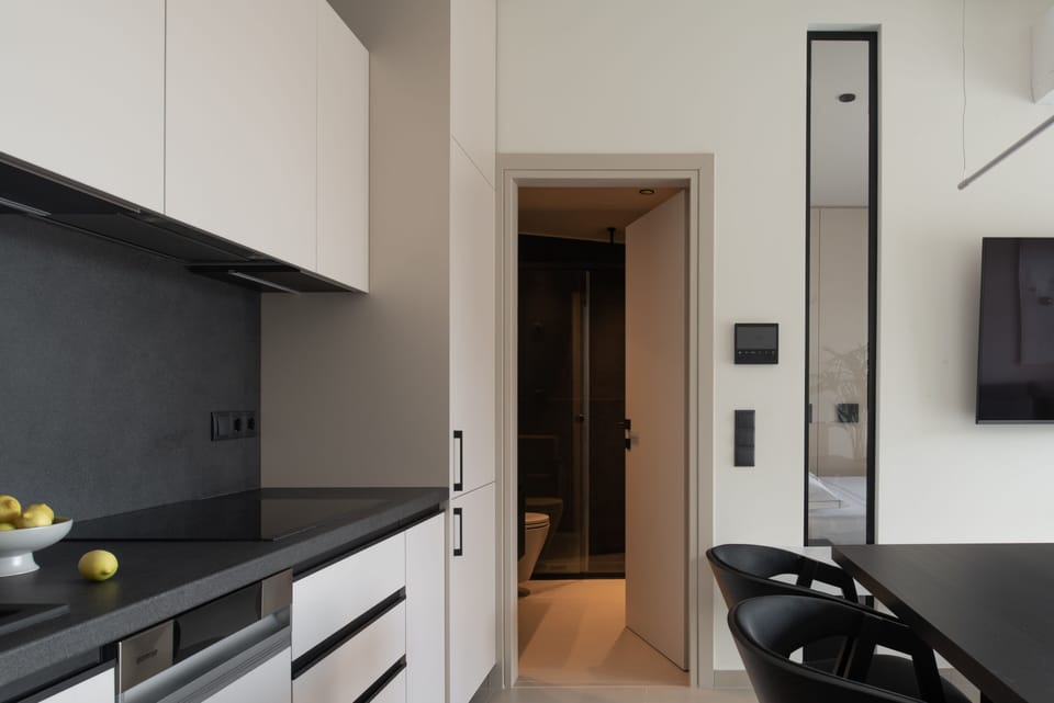 The bright & well-equipped kitchen is perfect for culinary gatherings.  

