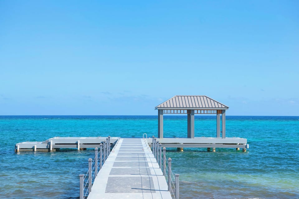 The resort's dock includes a cabana and ladder for gentle water entry for snorkeling. 