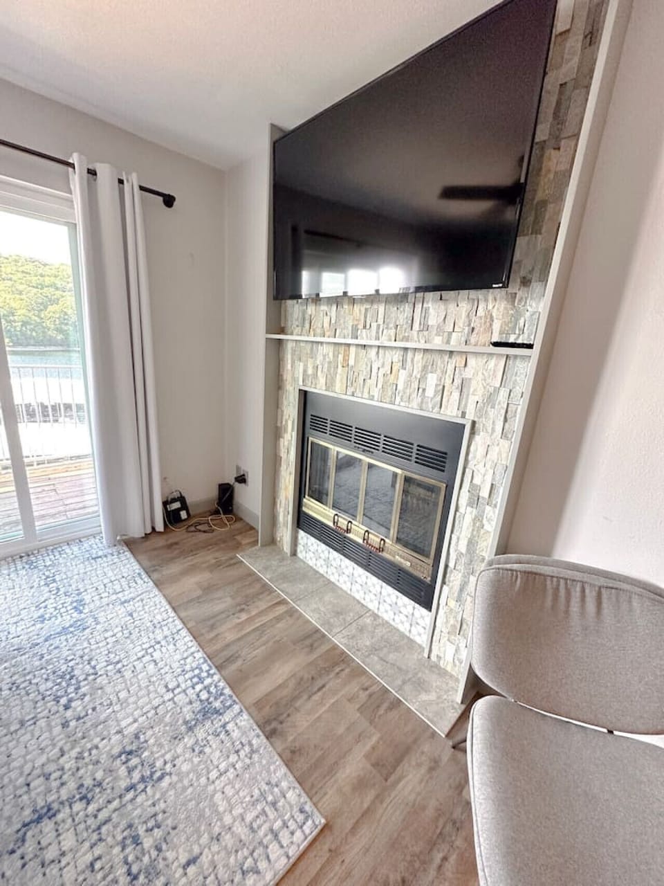 Unwind upstairs with a smart TV in the second-floor living area—perfect for streaming your favorite shows and movies in a cozy, elevated space