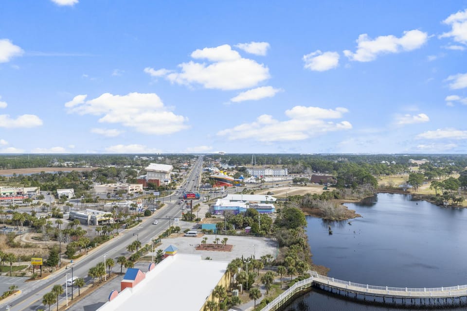 View of the main road and nearby waterway under a clear sky