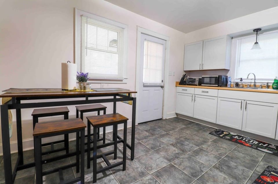 Kitchen and door leading into backyard
