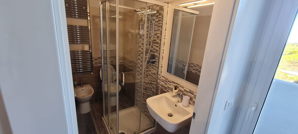 Deluxe Room, Multiple Beds, Sea View | Bathroom | Free toiletries, hair dryer, bidet