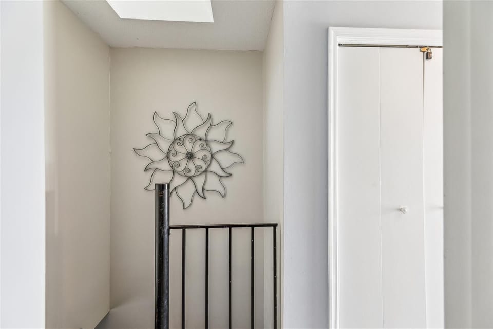 Natural light fills your entry hall through a skylight, creating a bright, welcoming space to start and end each day.