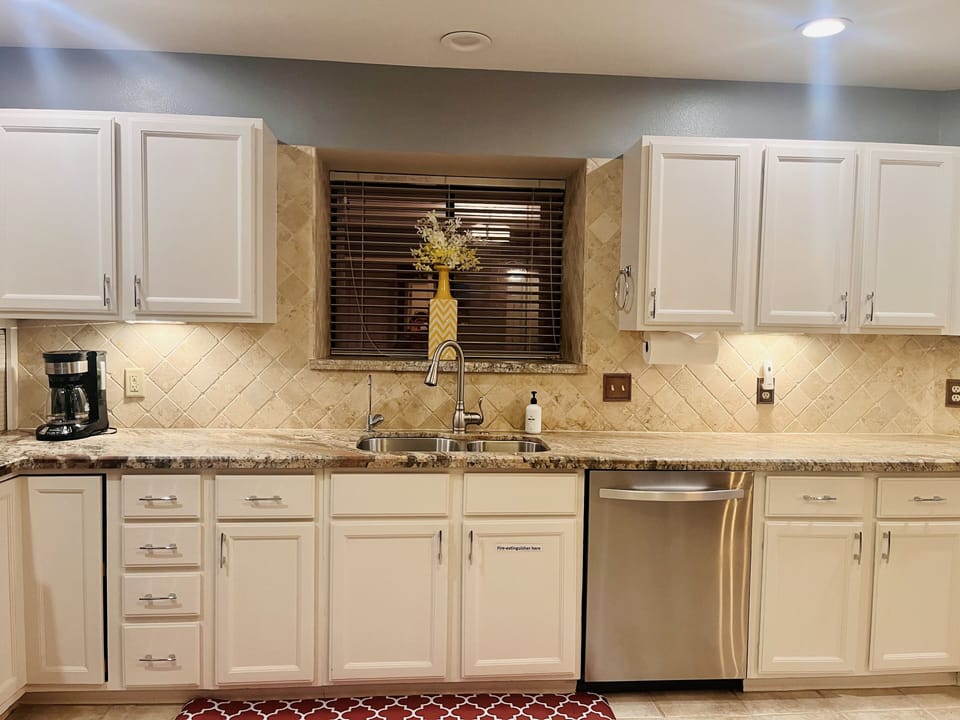 Large kitchen with views from window and RO filter faucet