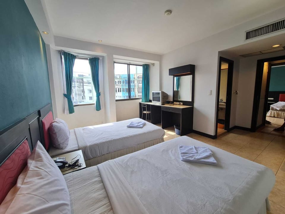Superior Double or Twin Room | Minibar, in-room safe, individually furnished, desk