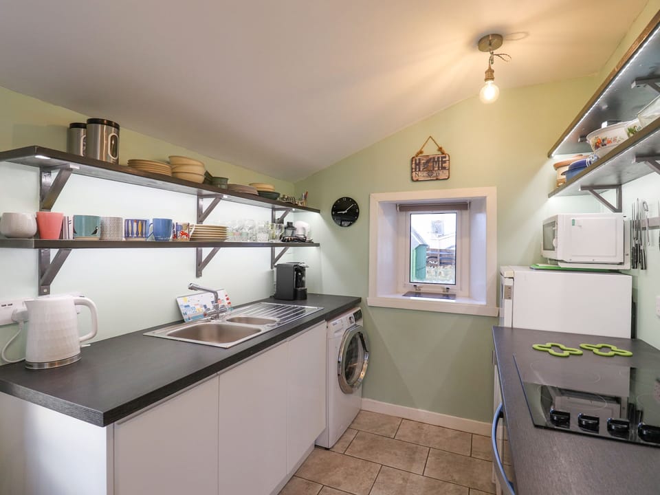 Fridge, dishwasher, electric kettle, cookware/dishes/utensils