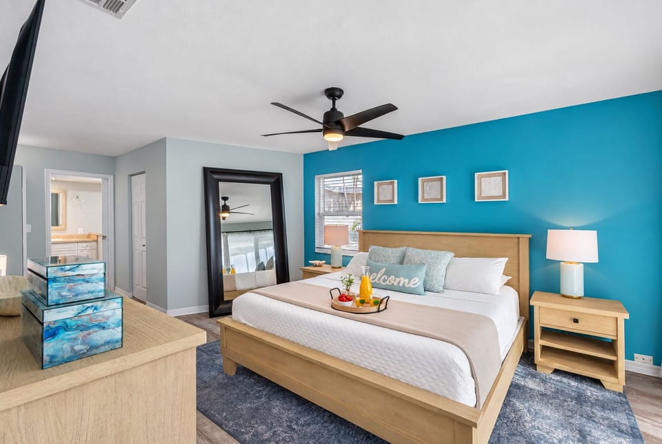 This stylish bedroom blends comfort and sophistication, offering a king bed, ensuite bathroom, and a peaceful atmosphere.