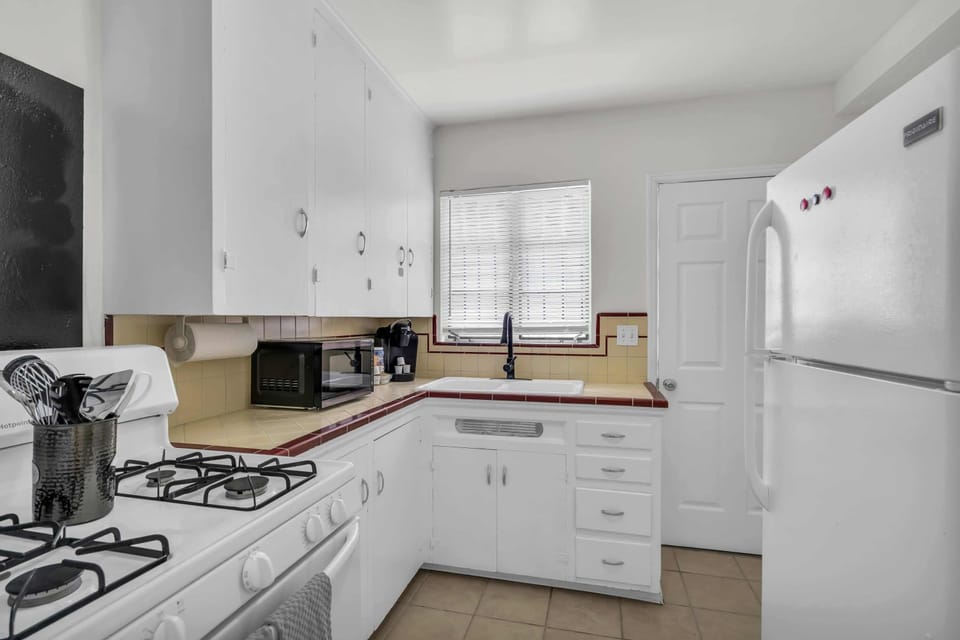 Prepare delicious meals in the fully stocked kitchen with modern appliances