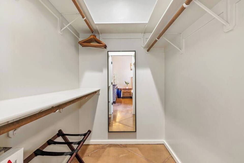 Step into luxury and organization - our walk-in closet is a fashion lover's dream come true