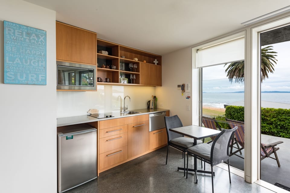 Honeymoon Studio Suite, 1 King Bed, Ocean View | Private kitchen | Highchair