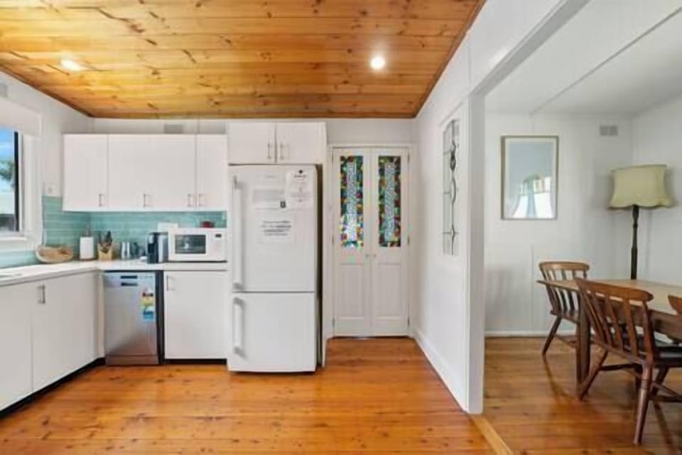 Dining room adjacent to the kitchen with space to seat 8 (extendable table)