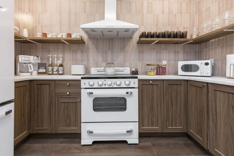 Kitchen with basic cookware and utensils. Comes with cups and glasses and plates. Complimentary breakfast includes custom hollyhock blend coffee from local roaster, k-cups, and tea. Breakfast bars, oatmeal, and popcorn are there for your enjoyment!