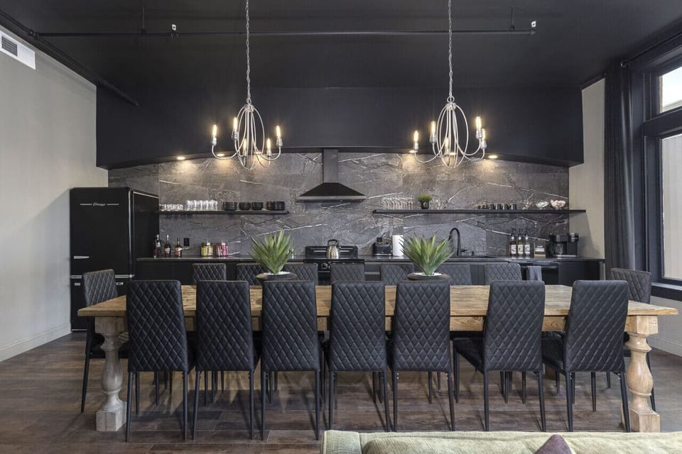 Chef's kitchen with a twelve foot dining room table. Coffee and Tea bar with custom blend coffee and k-cups.