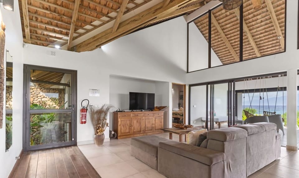 Spacious common area with tropical design.