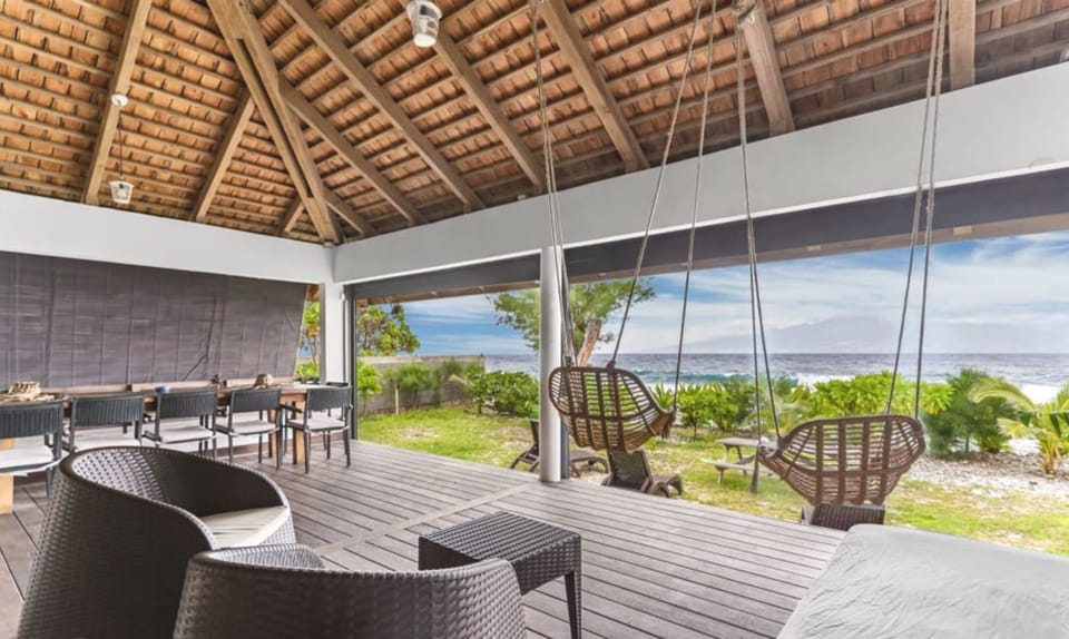 Covered terrace overlooking the shoreline.
