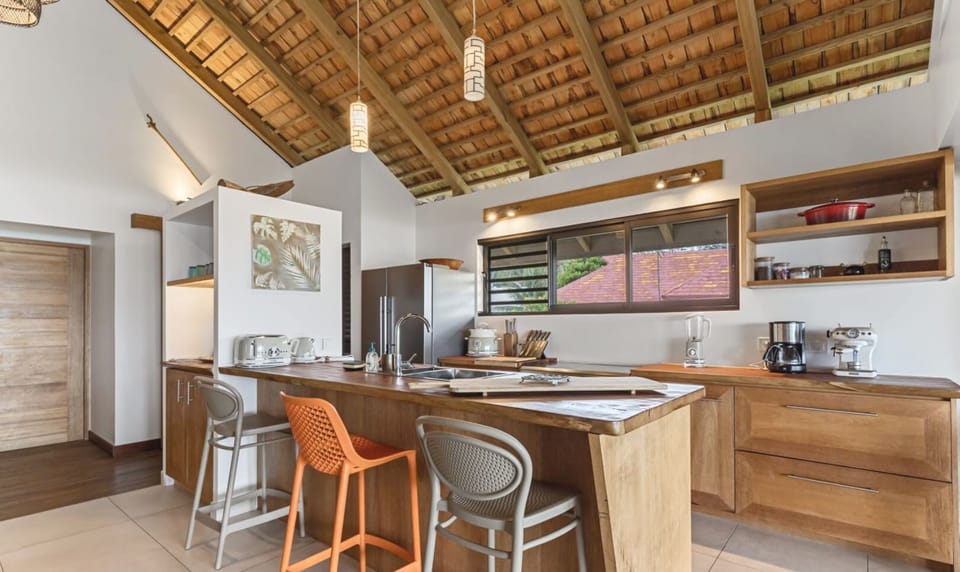 Kitchen breakfast bar with comfortable seating.
