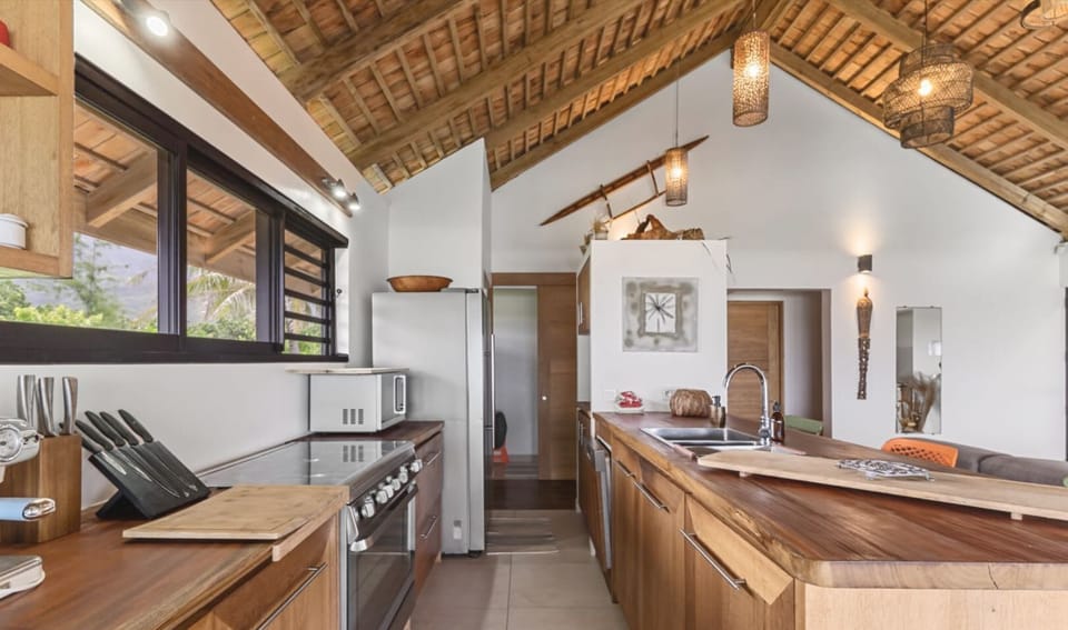 Kitchen area with open layout and natural lighting.