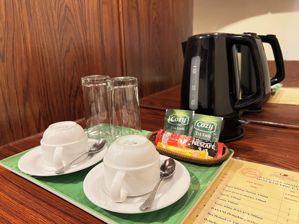 Studio Suite, River View | Minibar, in-room safe, iron/ironing board, free WiFi