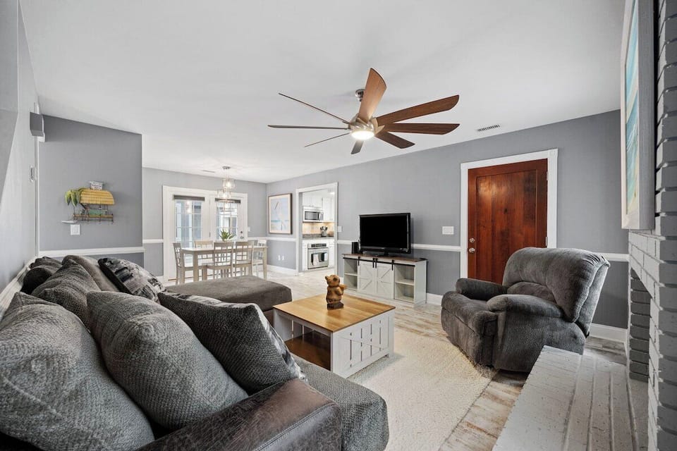 A comfy sectional fills the living room making it a great space to kick back.
