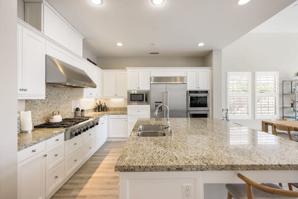 Bright kitchen with plenty of prep space for any meal.