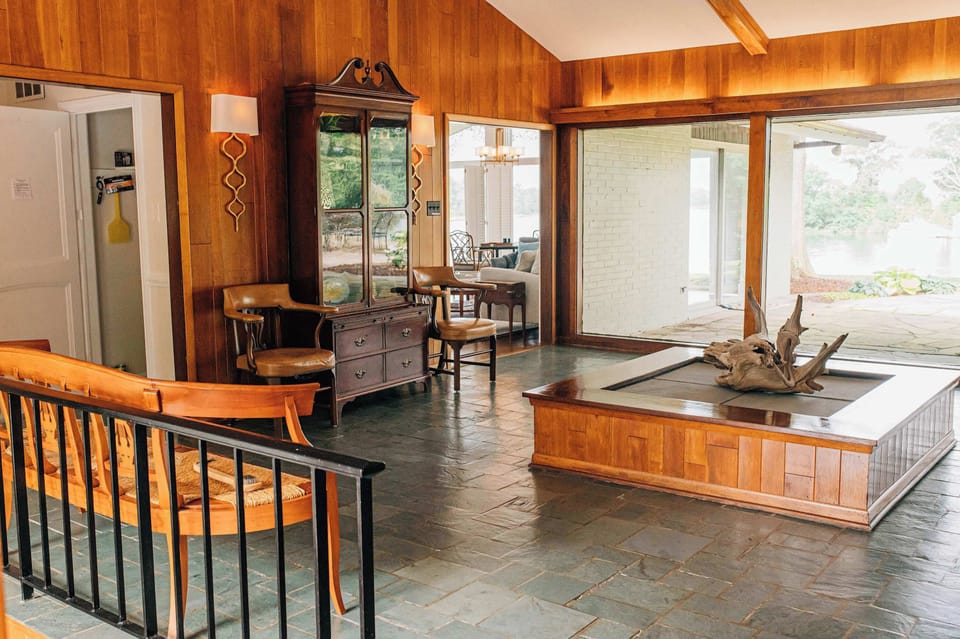 Relive the golden age of design in our mid-century haven in Irvington. Your vintage getaway awaits—where timeless architecture meets the tranquil beauty of the Chesapeake Bay. Sip coffee in a sun-soaked room wrapped in glass and sway in a hammock.