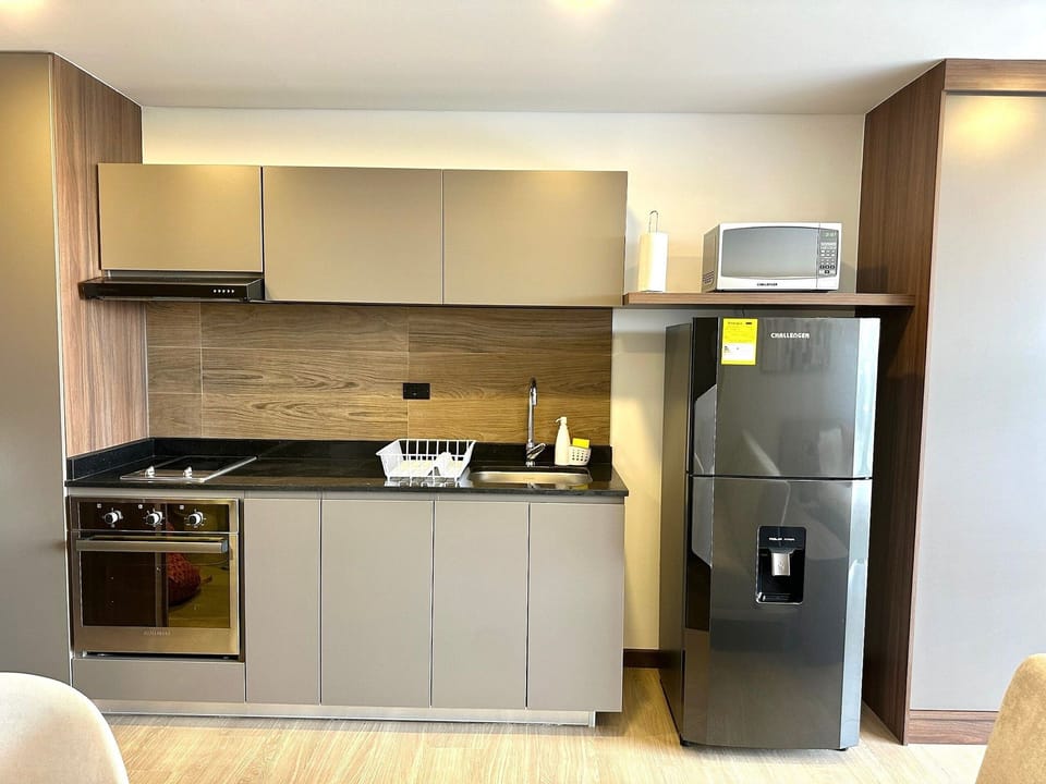 Apartment | Private kitchen | Fridge, microwave, coffee/tea maker, electric kettle