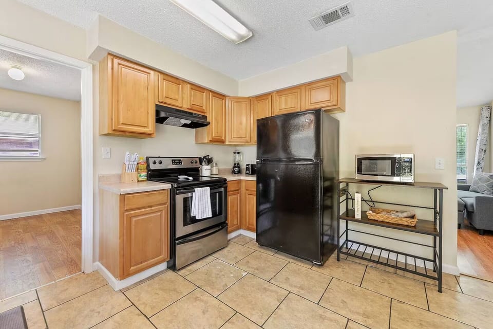 Compact kitchen with full appliances