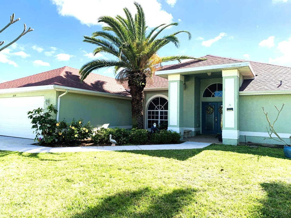 Large Split Plan Home with a fenced Side yard for pets or children.