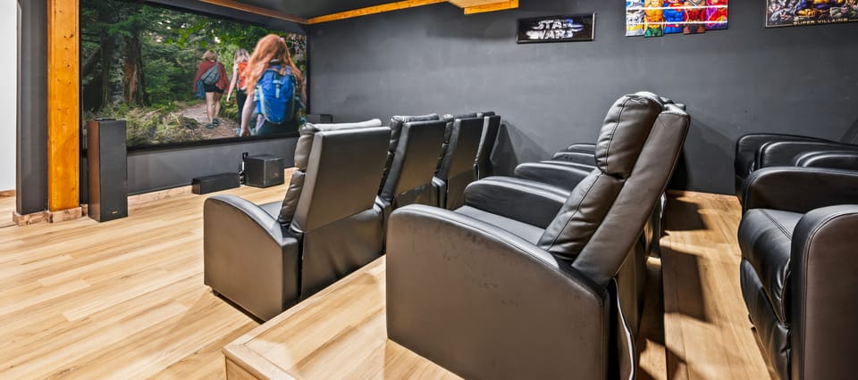 Your Private Home Theater w/ 12 Recliners, 120" Screen, 4K/8K UHD HDR, Dolby Sound, Roku TV & Smart Apps for Ultimate Movie Nights!