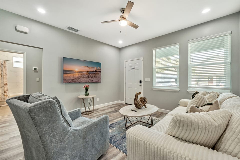 Surrounding the sofa are several comfortable couches and armchairs, each offering its own unique charm and allure.