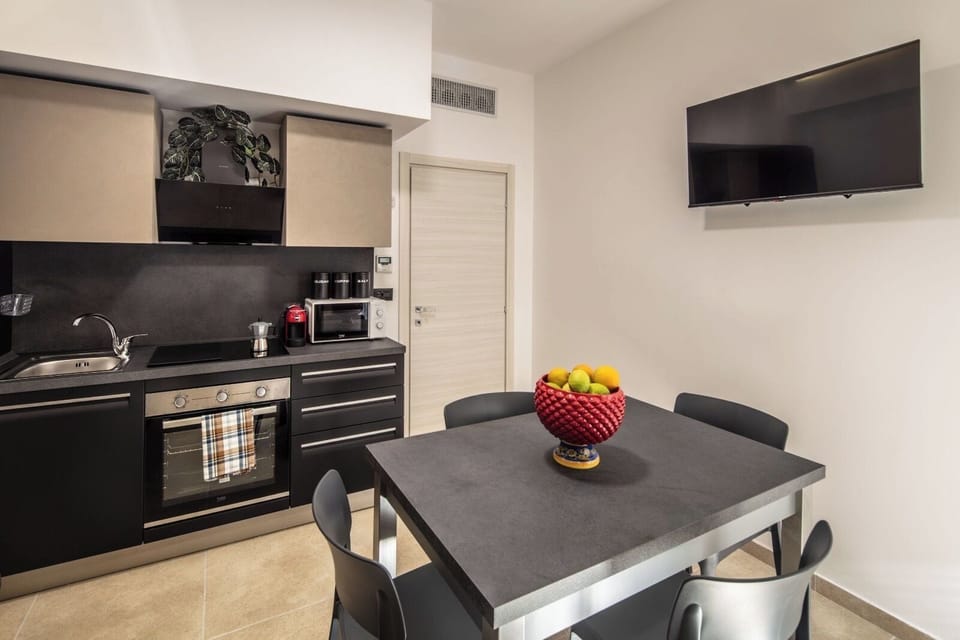Panoramic Apartment, Balcony, Sea View | Private kitchen | Espresso maker, coffee/tea maker, mini-fridge, electric kettle