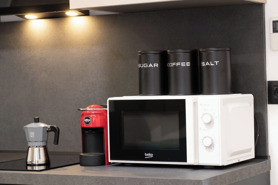 Panoramic Apartment, Balcony, Sea View | Private kitchen | Espresso maker, coffee/tea maker, mini-fridge, electric kettle