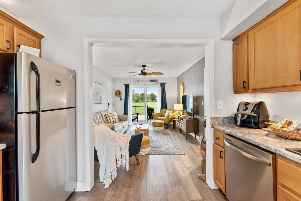 Open sightline from kitchen into the living room for easy flow.

