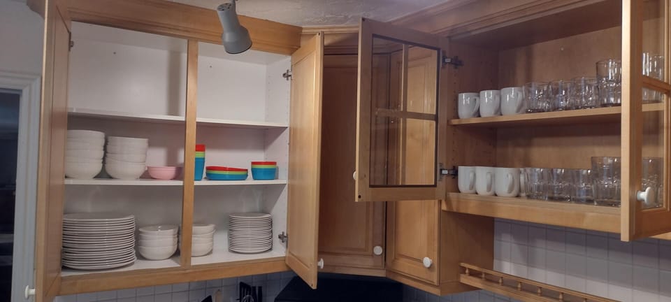 Kitchen stocked with new pots/pans, dishes, glasses, mugs, kiddy dishes...