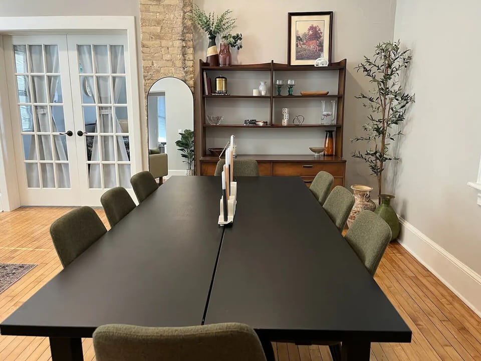 Large dining table with 8 seats.
Plenty of games to play on it!