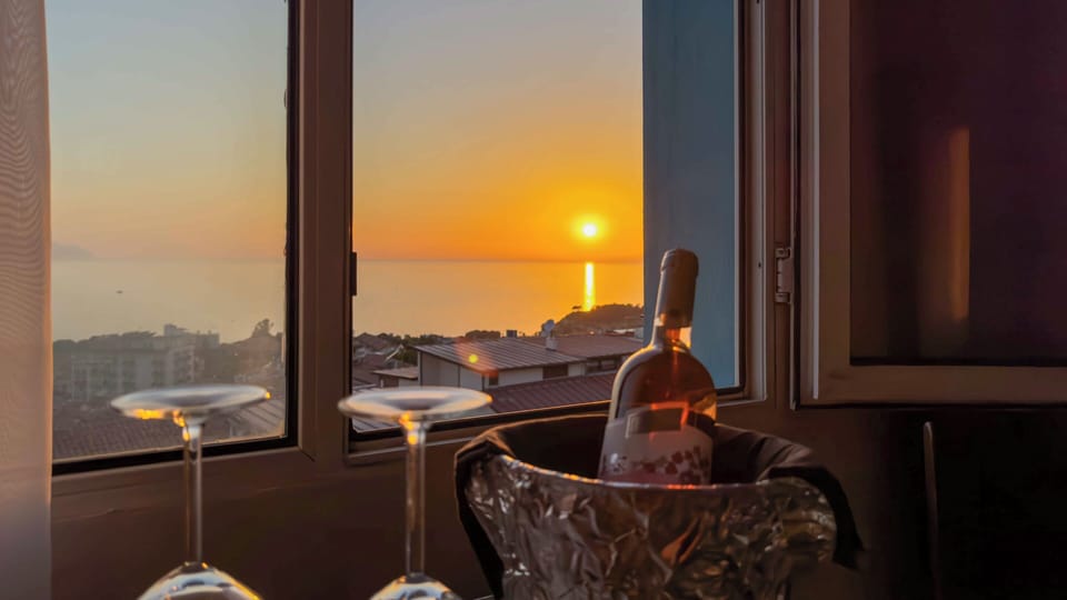 Luxury Suite, 1 Bedroom, Sea View | 1 bedroom, minibar, desk, laptop workspace