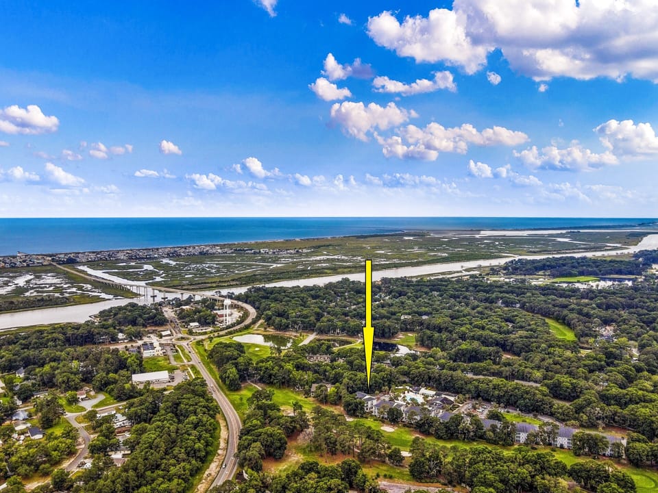 You are hear, near the roundabout near the park, restaurants and shopping.