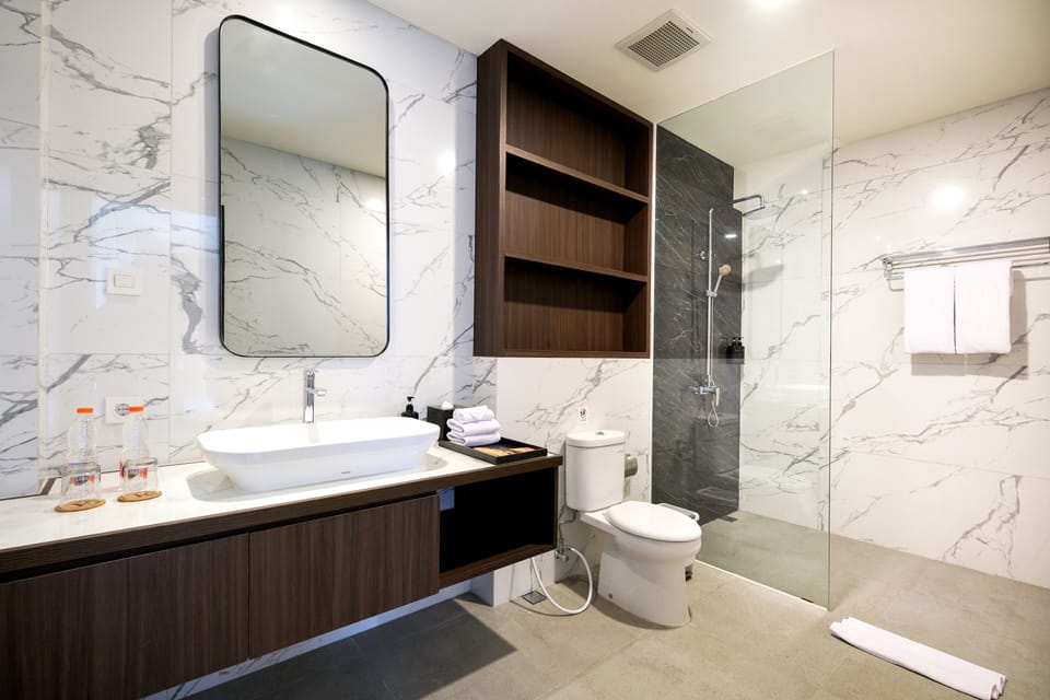 Shower, hydromassage showerhead, designer toiletries