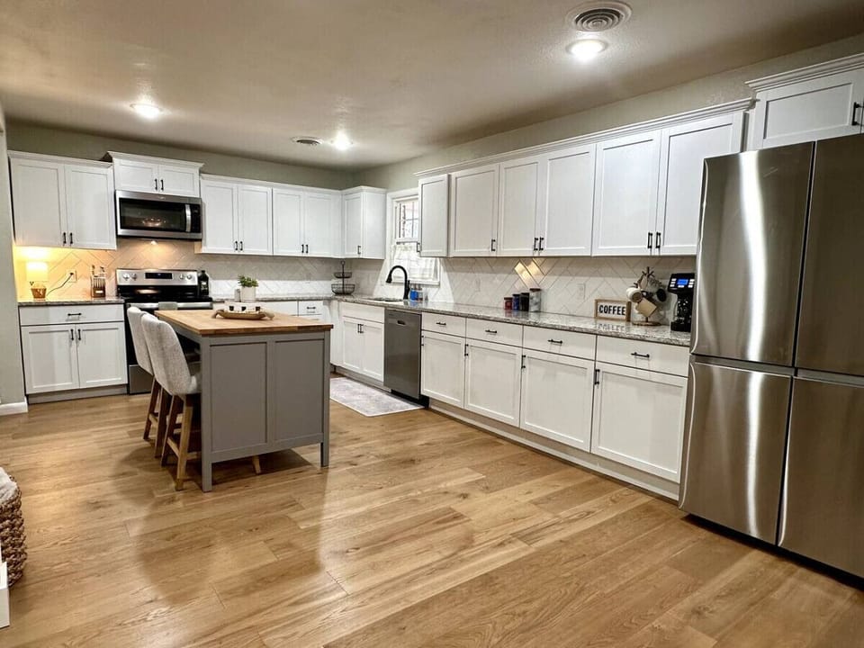 Updated, bright, fully-equipped kitchen with new appliances and abundant counter space
