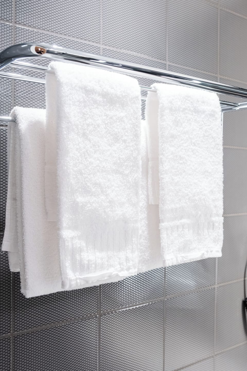 Shower, rainfall showerhead, hair dryer, towels